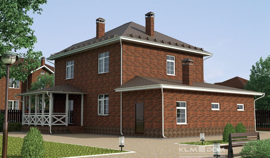 Двухэтажный кирпичный дом в классическом стиле