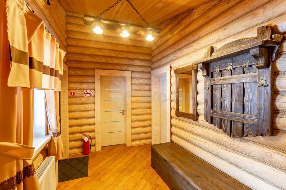 Дизайн комнаты отдыха в бане в деревянном стиле простой вариант