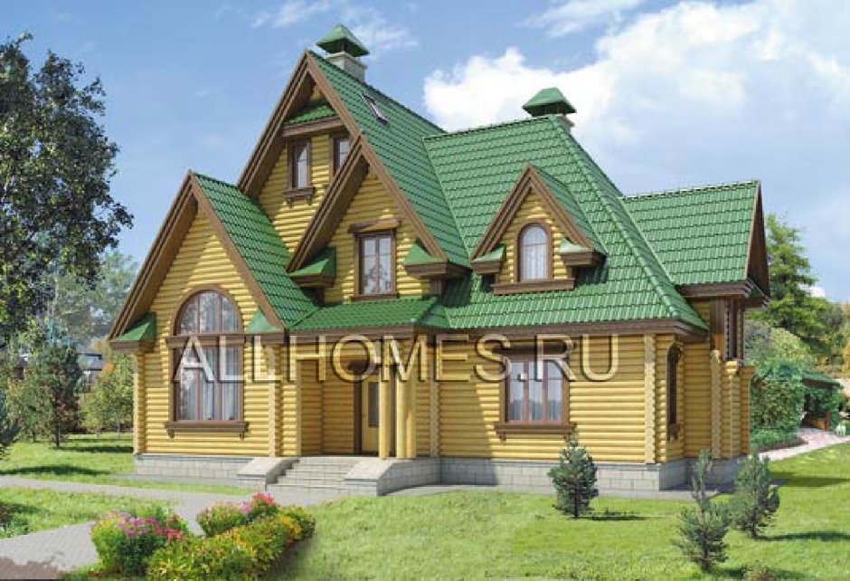 Срубовой дом с зеленой крышей