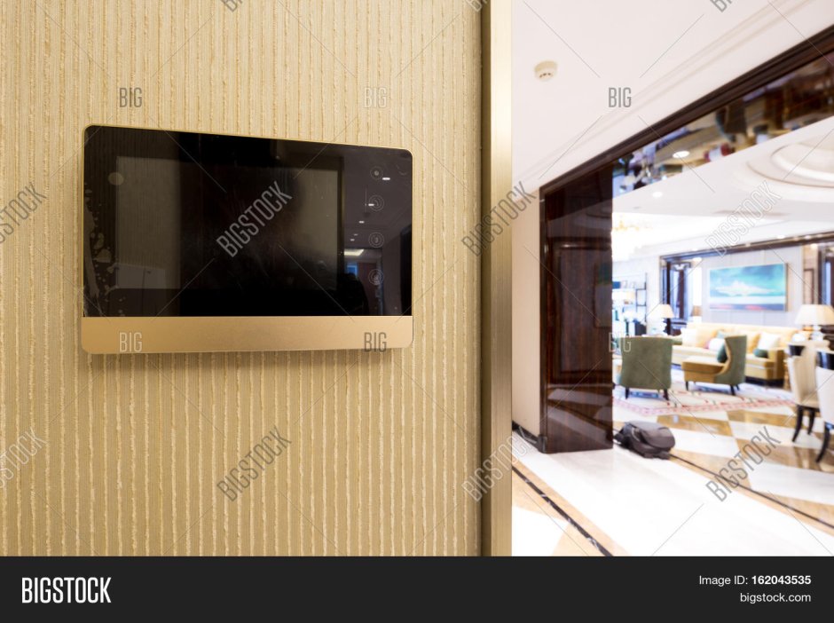 Intercom Video Door Bell on the Wall outside Modern Living Room