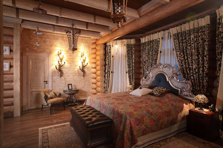 Интерьер спальни в бревенчатом доме в русском стиле