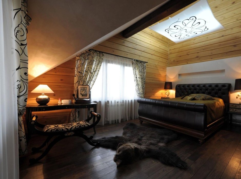 Спальня в деревянном коттедже