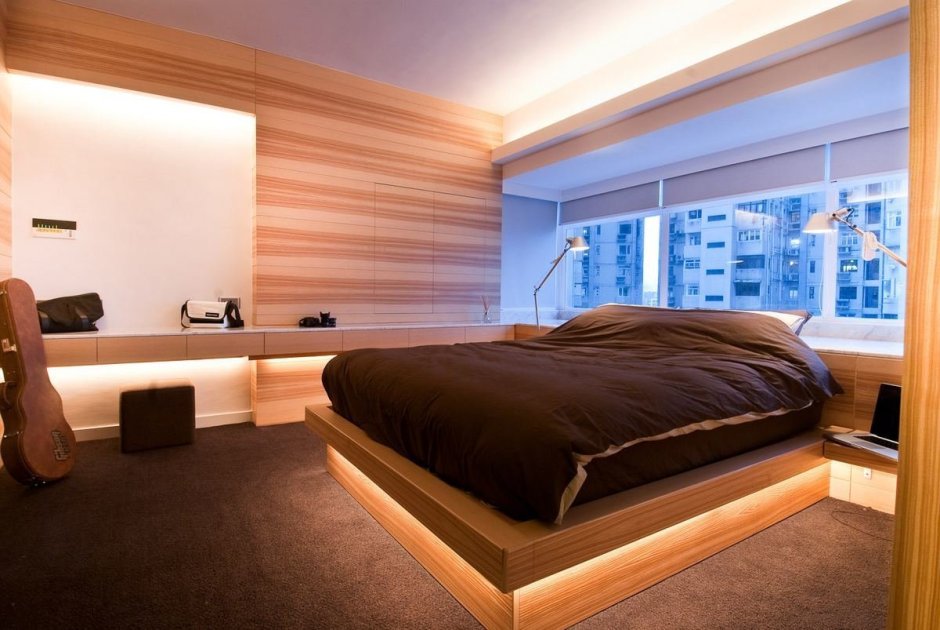 Кровать-подиум у панорамного окна