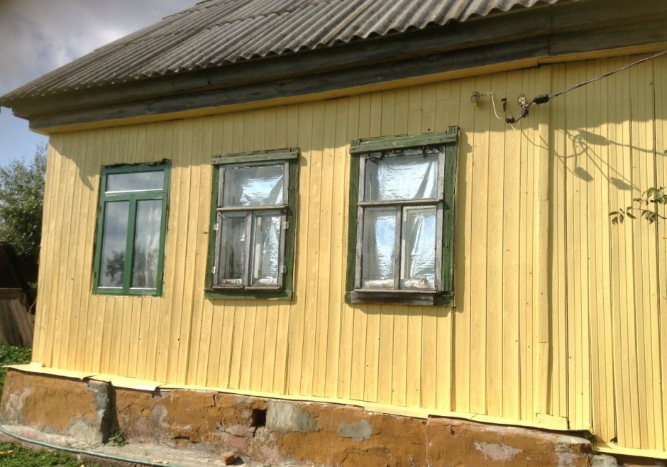 Покрасить дом в деревне