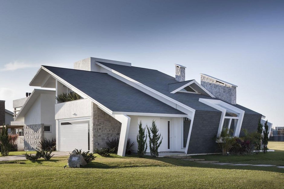 Дом в стиле Модерн со скатной крышей