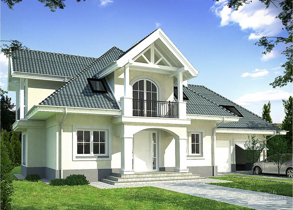 Красивый дом с зеленой крышей