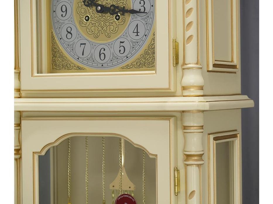 Часы Говард Миллер с маятником настенные