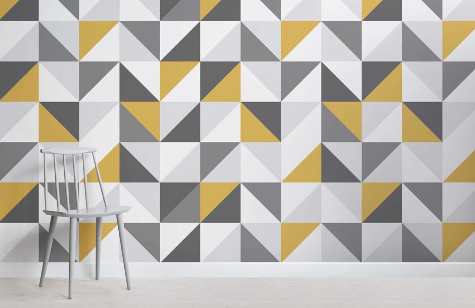 Геометрический желтый узор на стене