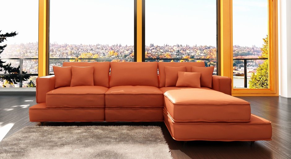 Оранжевый кожаный диван