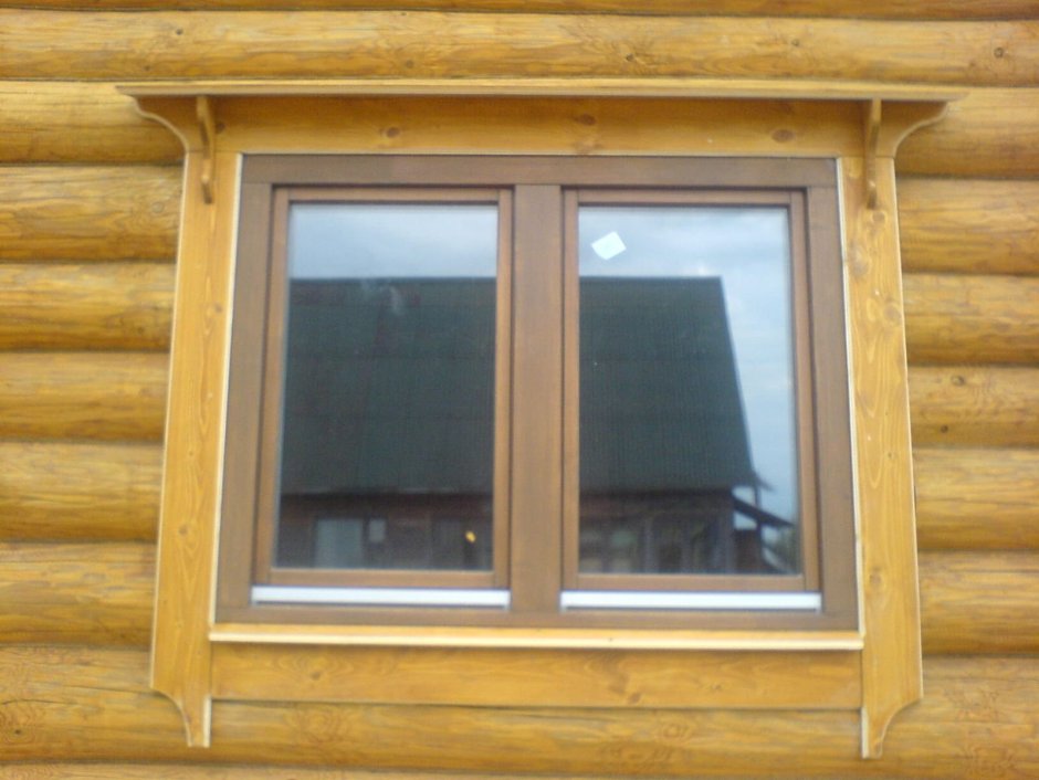 Студия Кузьмич деревянная домовая резьба