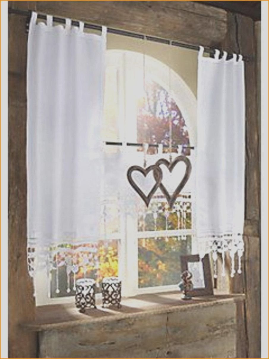 Шторы на кухню с атласными лентами