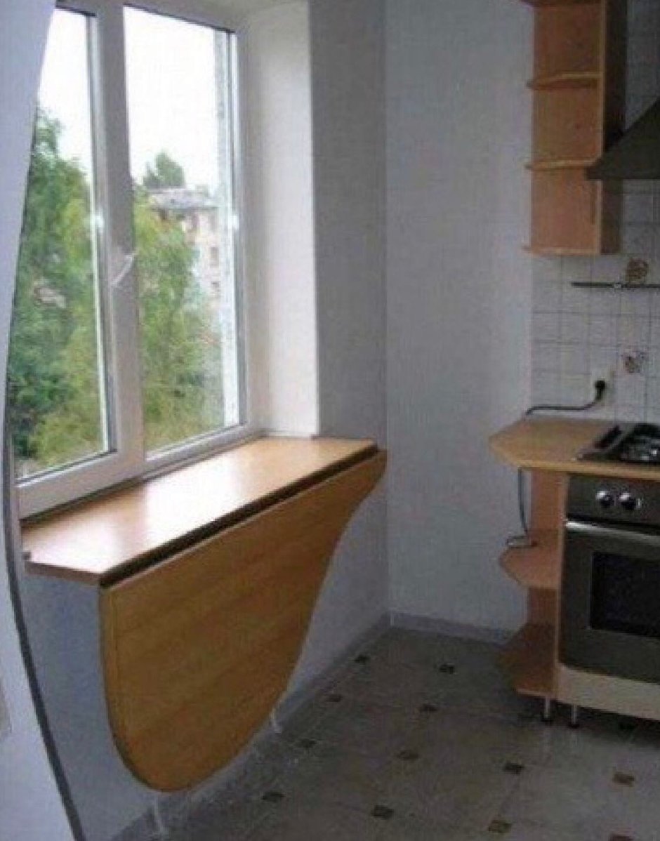 стол из подоконника на маленькой кухне