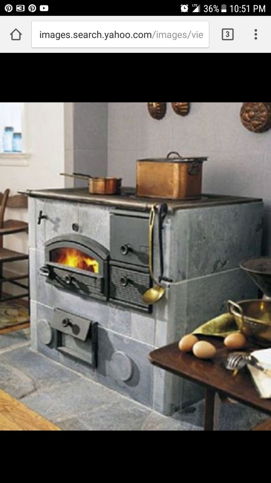 Русская печь с плитой в кухне
