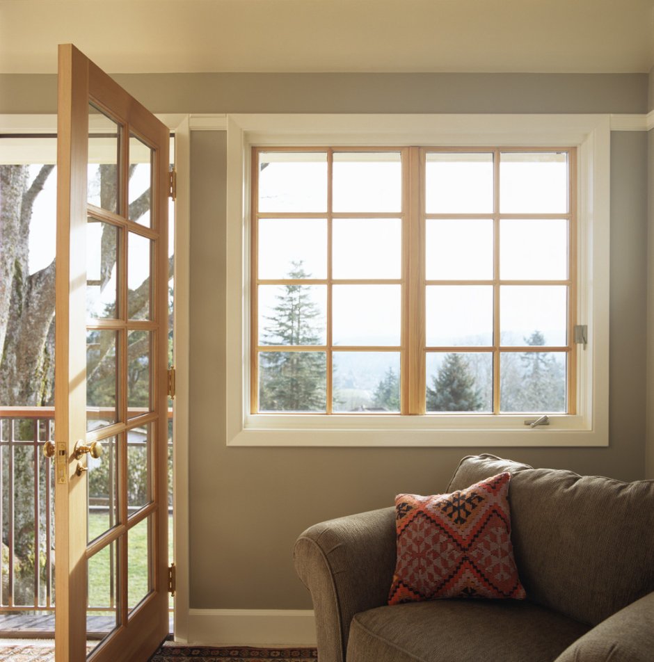 Серые шторы в интерьере спальни