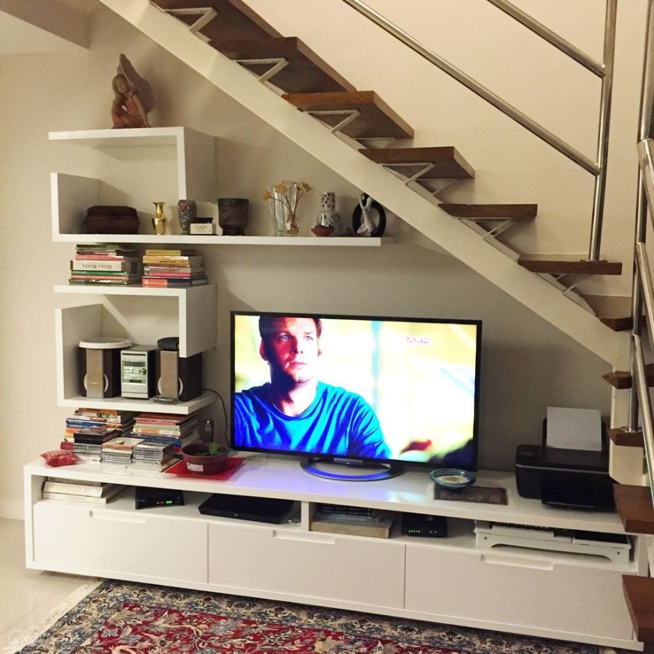 Стенка с телевизором под лестницей