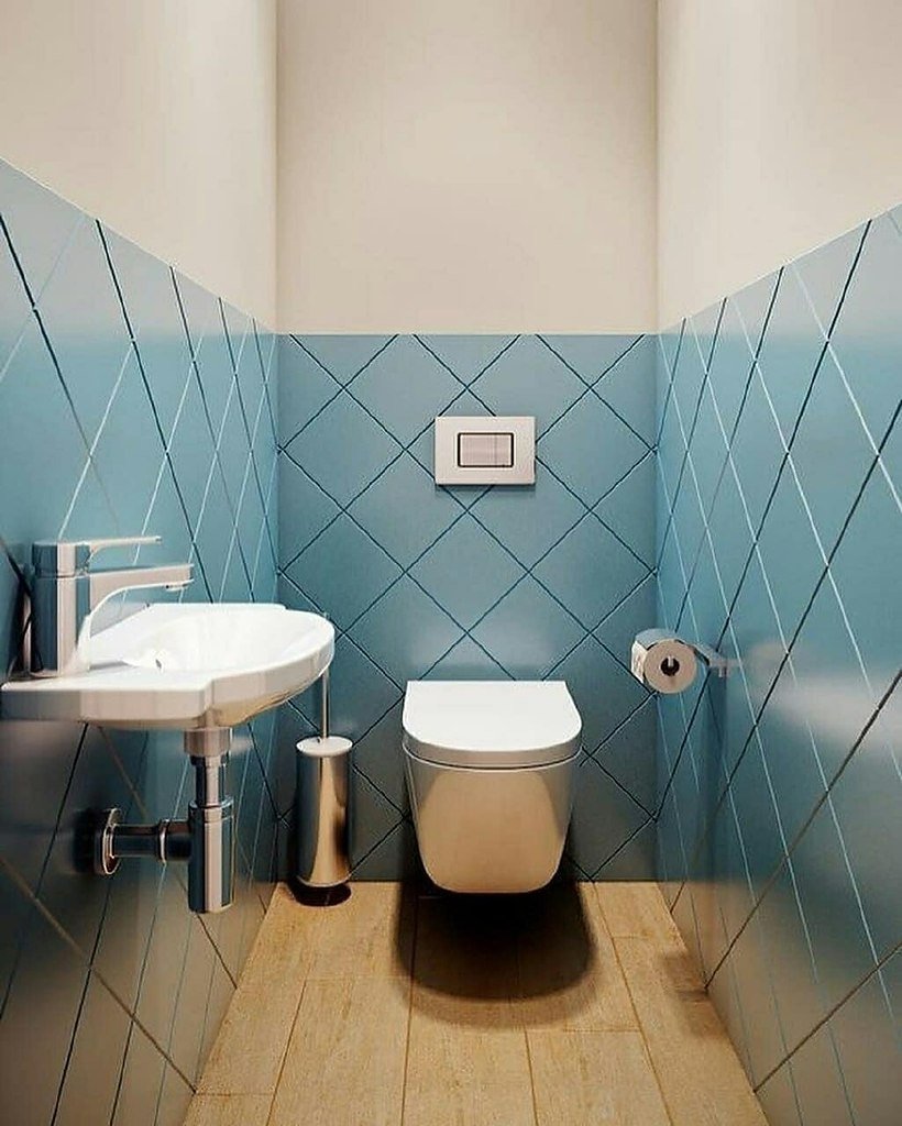 Туалетная комната с инсталляцией и раковиной