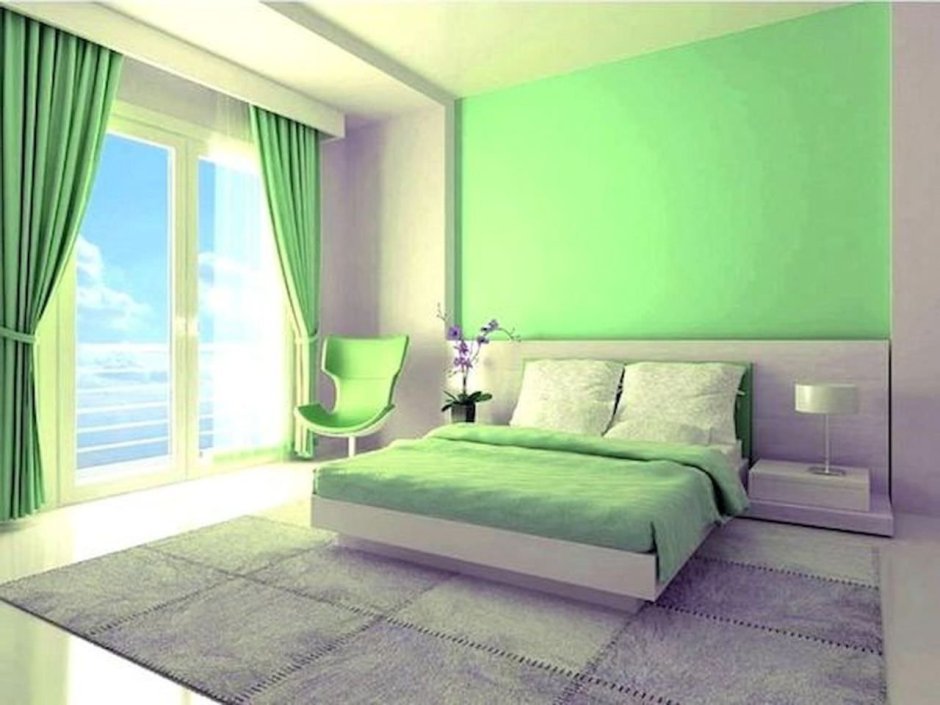 Спальня в светлых тонах с зеленым акцентом