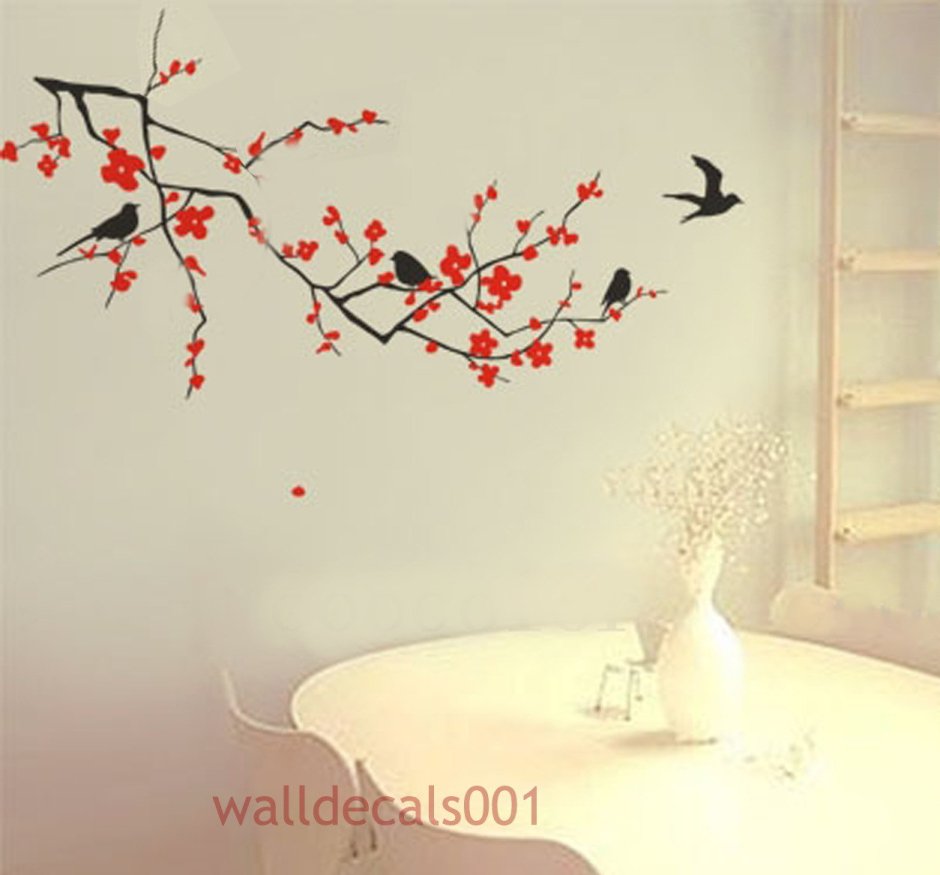 Сакура на стене с птичкой