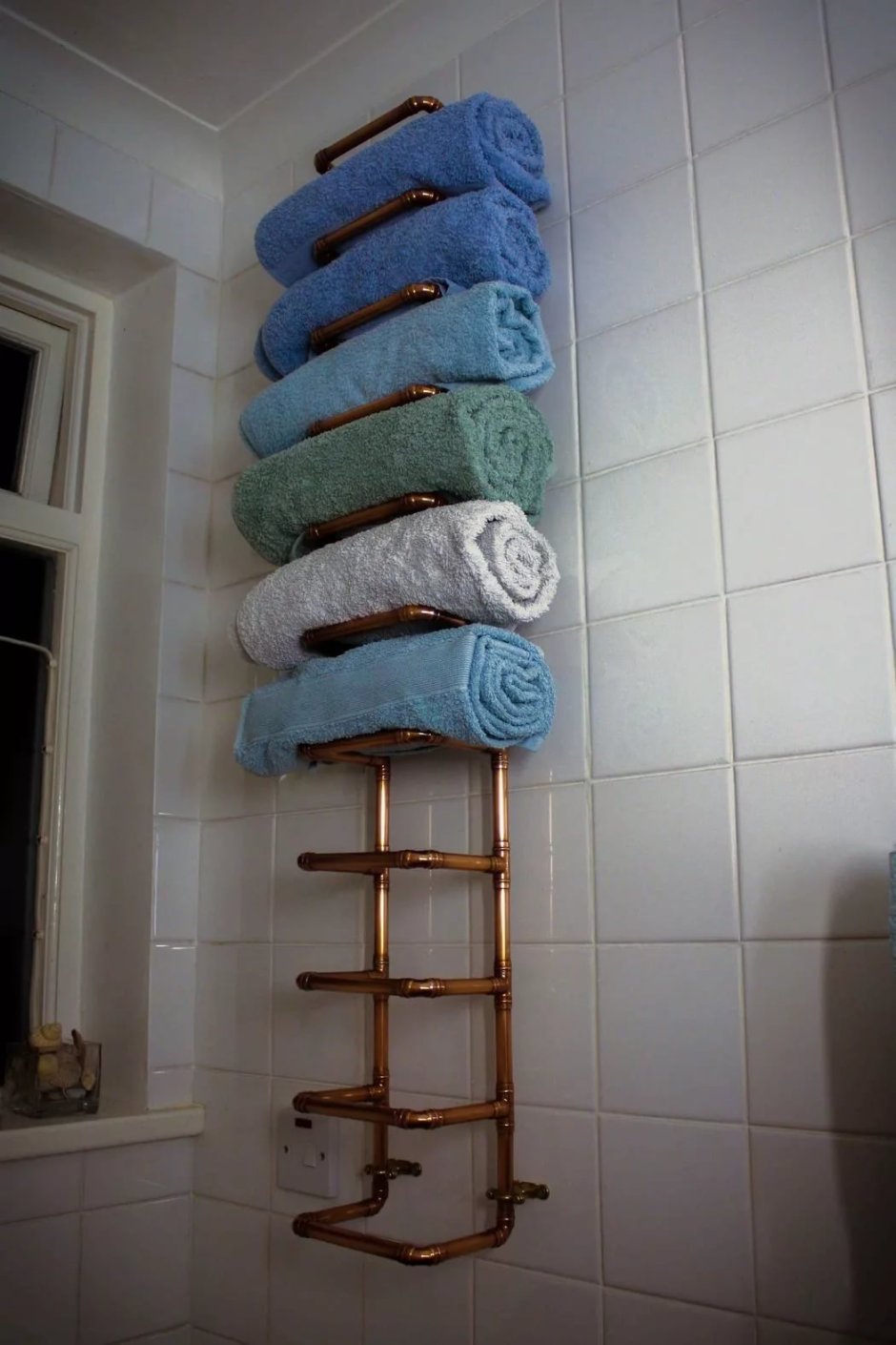 Полки для хранения полотенец в ванной