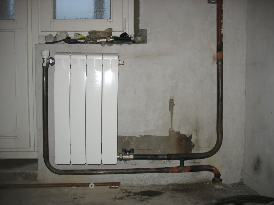 Радиатор отопления в квартирах панельных домов