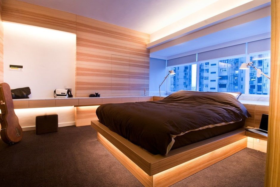 Деревянные стеновые панели в интерьере спальни