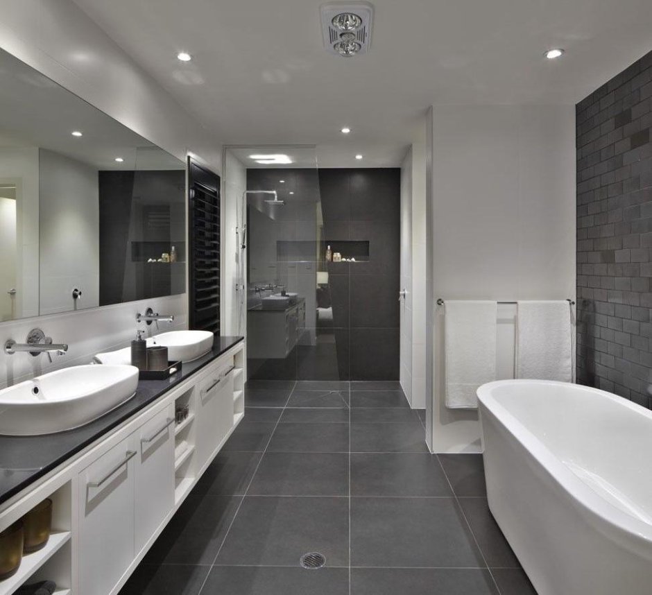 Туалет с раковиной в серых тонах с в современном стиле