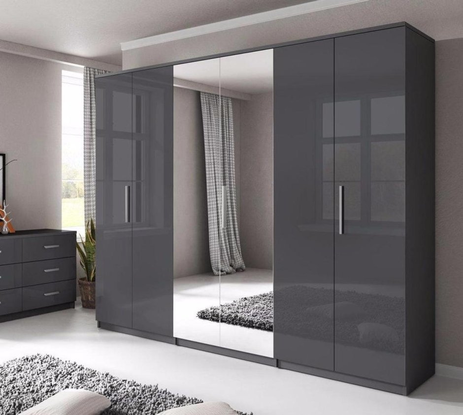 Серый шкаф в спальне