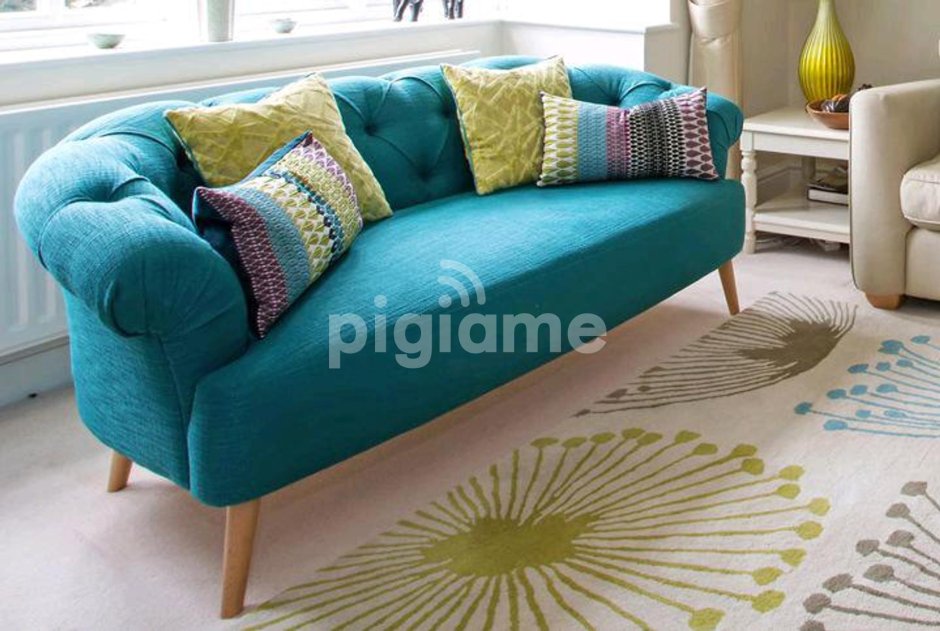 Бирюзовые подушки на диван