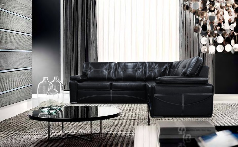 Стильный интерьер с черным диваном