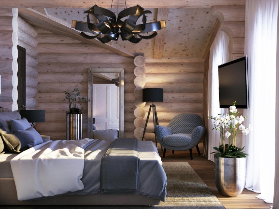 Спальня в доме из оцилиндрованного бревна