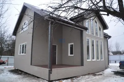 Наружная отделка дома из сип панелей — фасадные панели kmew